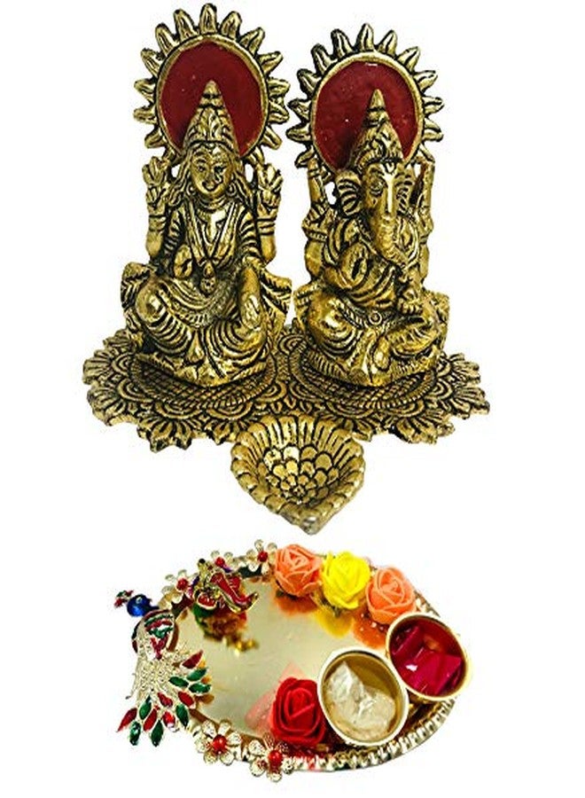 طبق عبادة إيفيشا اللورد لاكشمي غانيشا والطاووس